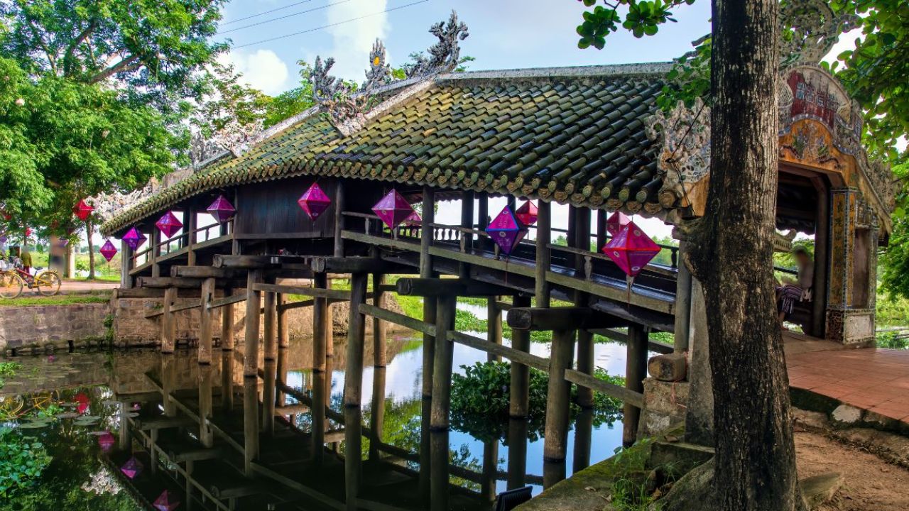 Cross the Historic Thanh Toan Bridge